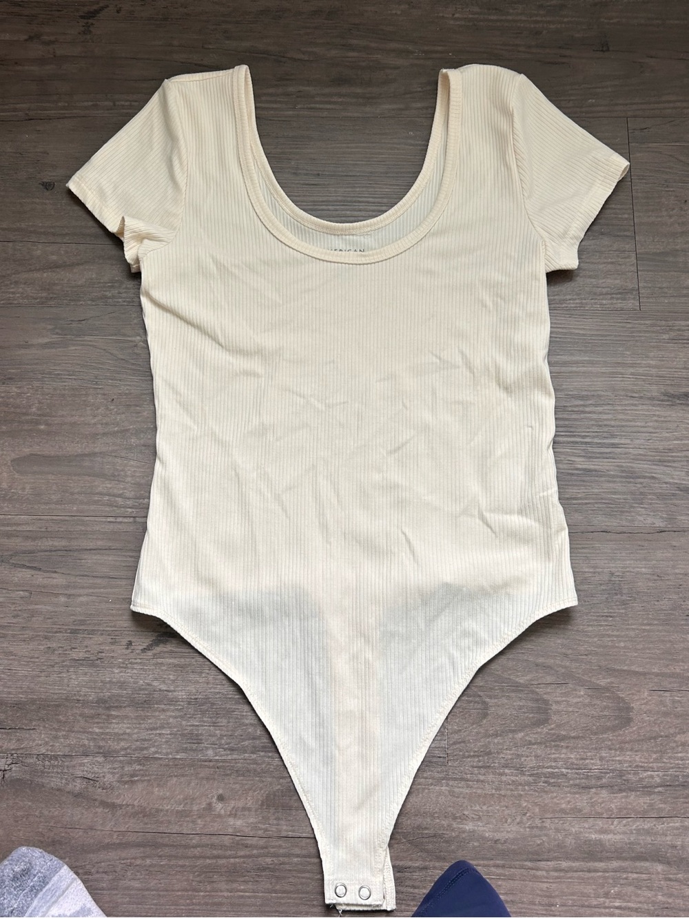 American Eagle Outfitters Ribbed Scoop-Neck Short-Sleeve Bodysuit in Cream
